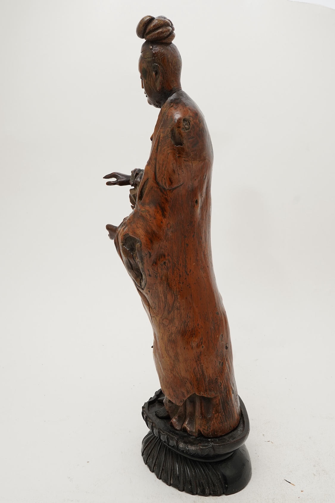 A Chinese rootwood standing figure of Guanyin, 18th/19th century